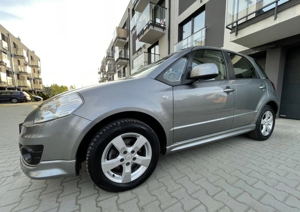 Suzuki SX4 cena 29990 przebieg: 200000, rok produkcji 2011 z Skawina małe 232